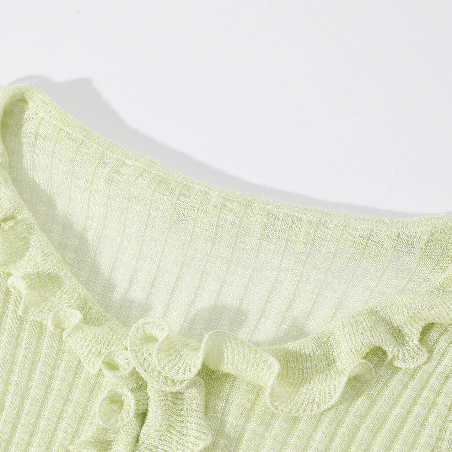 Neckline and rib-knit detail of APP-001